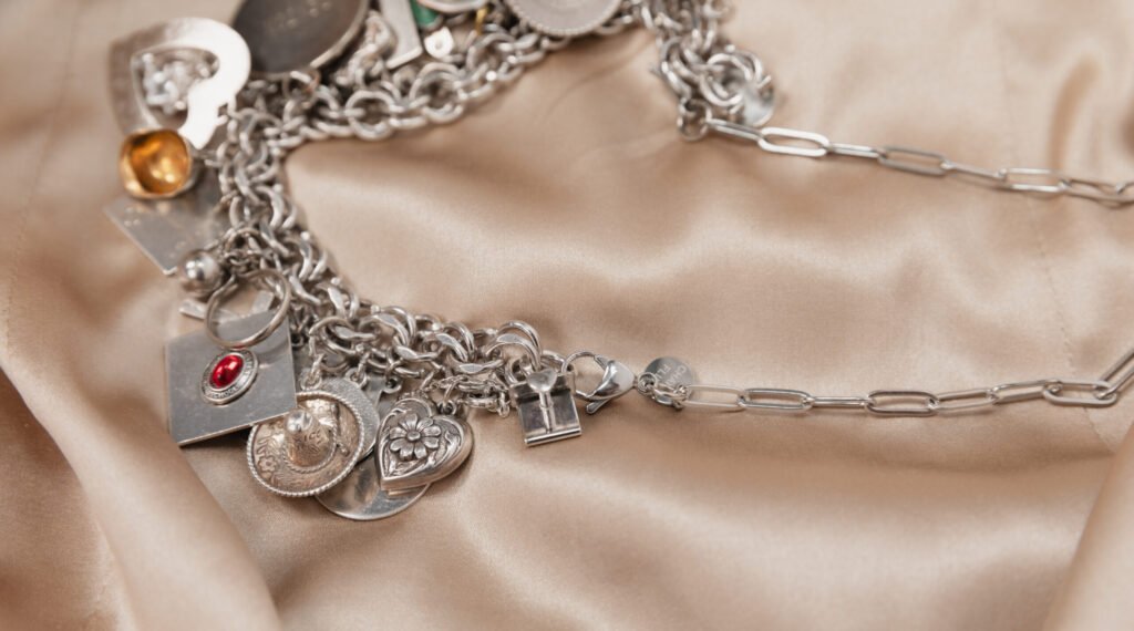 Silver bracelet turned in a necklace by using the CharmFlipTM silver chain